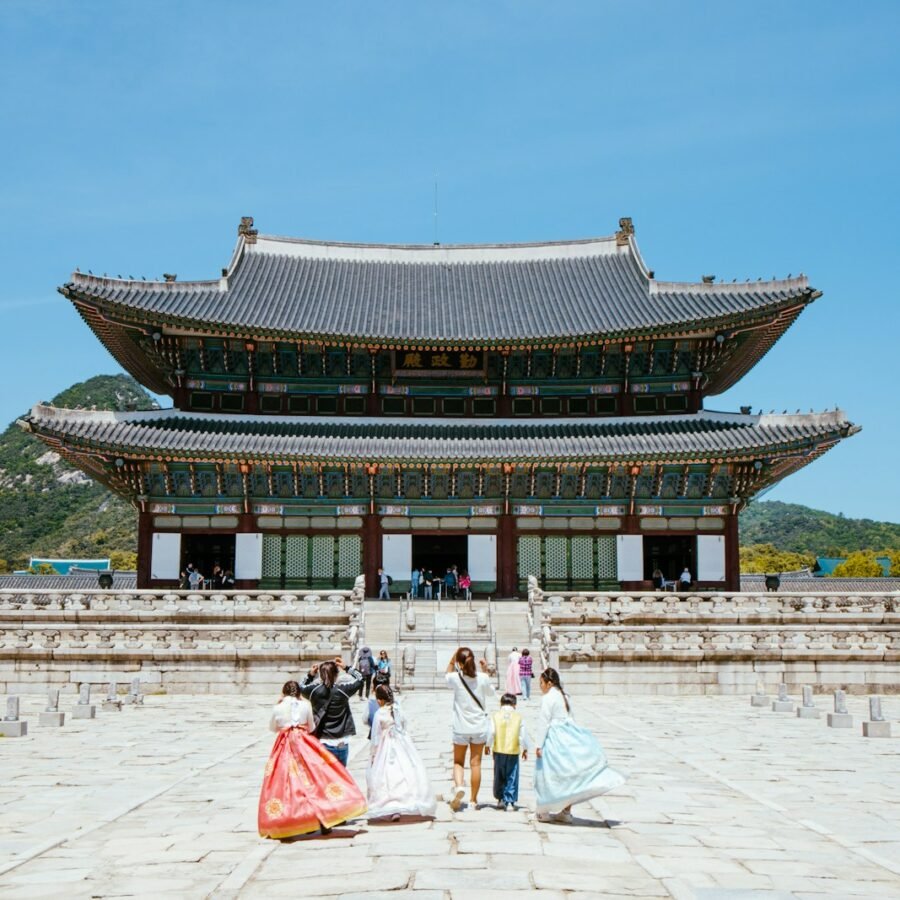 a group of people standing in front of a building
